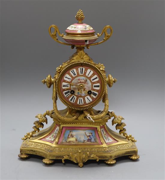 A 19th century French ormolu and porcelain mounted mantel clock